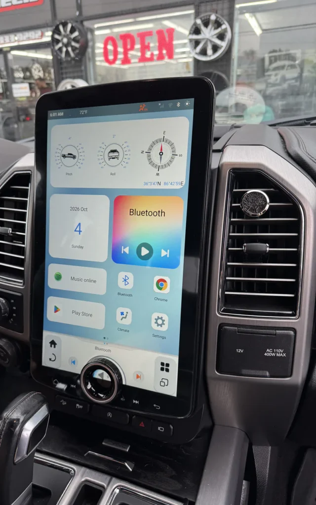 CarPlay display installed in a vehicle dashboard.