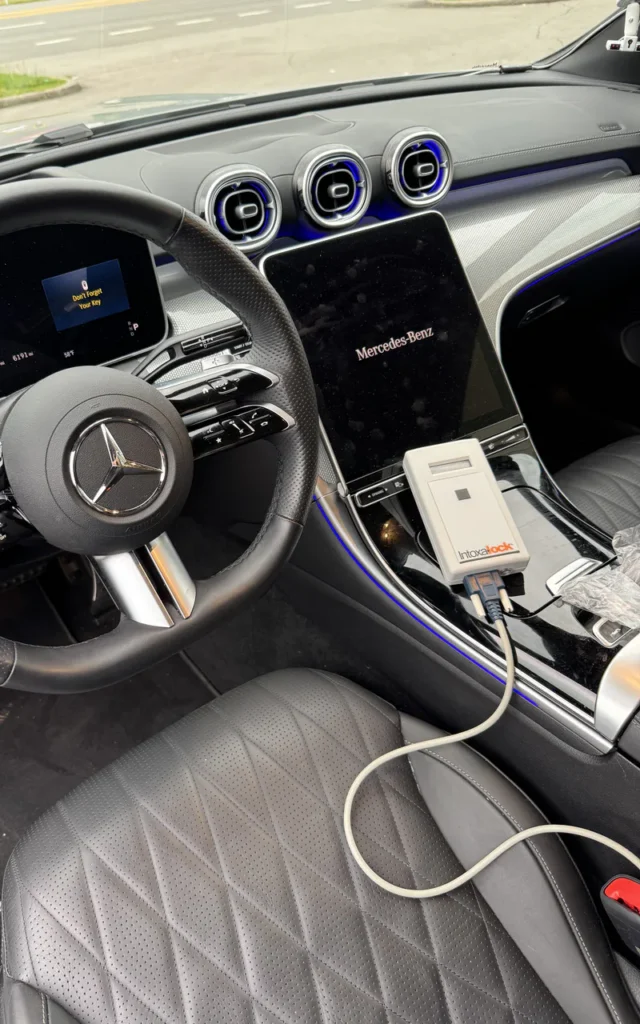 Device connected during a Mercedes vehicle security installation.