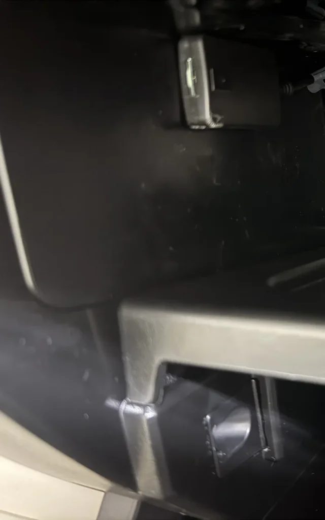 Close-up of a vehicle door-mounted switch panel.